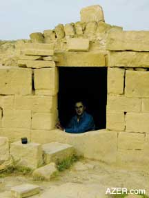 Gobustan-Gizildash region. Foreground may have been water collection system from the Bronze Age. The background shows a cistern that possibly dates to the Silk Road era.